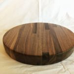 Turned laminated walnut cutting board